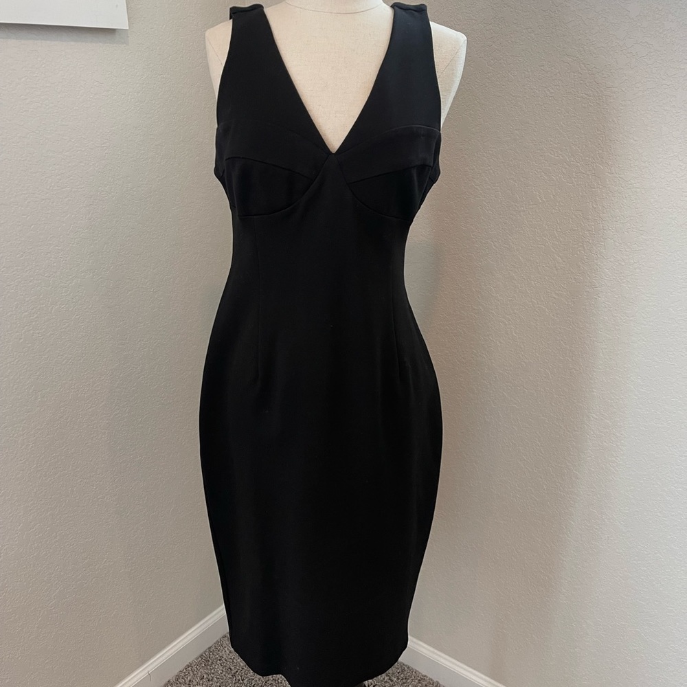 SOLD.   Krisa black ponte dress